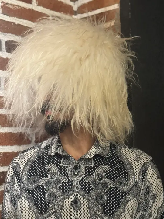 Very White Sheepskin Papakha, three-quarter view: shaggy bright white wool, longer at the sides