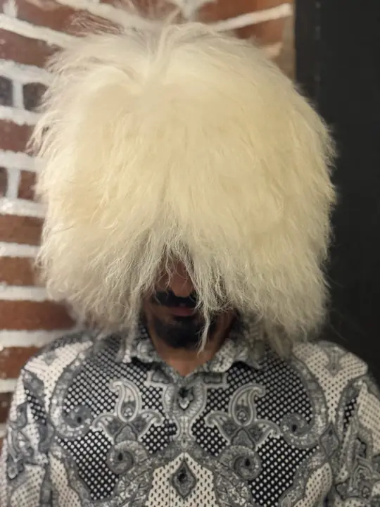 Very White Sheepskin Papakha seen from slightly above: the crown of long, straight bright white wool